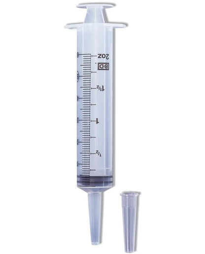 Catheter tip syringe with cap for administering oral medications to sheep.