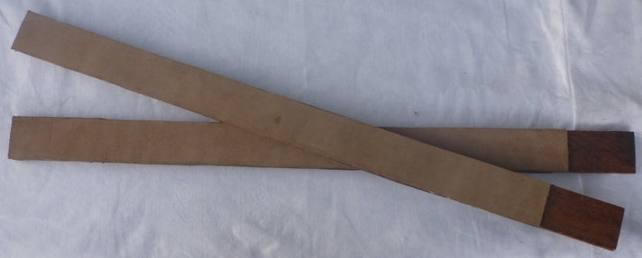 Double sided hard backed sharpening strops.